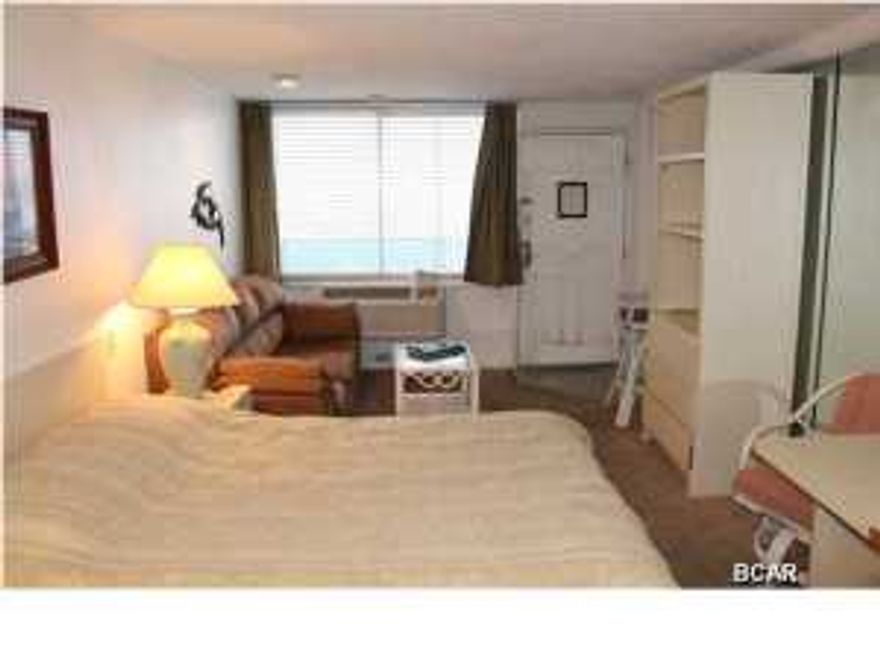 Fontainebleau Terrace is a great low rise gulf front condo complex. This east facing top floor fully furnished efficiency unit even has an adjoining door to the unit next to it, which is also for sale. Purchase one or purchase both. Come see these great bargains today! (all information approximate, please verify)