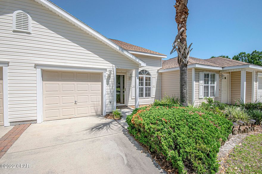 CURRENTLY UNDER CONTRACT, SELLER ACCEPTING BACKUP OFFERS Dreaming of a home near the beach? Come see this lovely Palmetto Trace 3 bedroom/ 2.5 bath town home located near Pier Park and 1 1/2 miles to the beach! This home has it all! With a coveted central PC Beach location, updated in 2017 and offers bamboo hardwood flooring, real wood kitchen cabinetry, Nest thermostat, newer appliances and 2019 roof.  Great floor plan with 1st floor Master bedroom, vaulted ceilings in the great room, screened in patio off of spacious kitchen.  Upstairs are two bedrooms with Jack and Jill bathroom, and a loft landing. Palmetto Trace offers two community pools, sidewalks throughout, 1 mile or less to Pier Park and Frank Brown Recreation Park and less than a 5 minute drive to the Gulf of Mexico and pier.