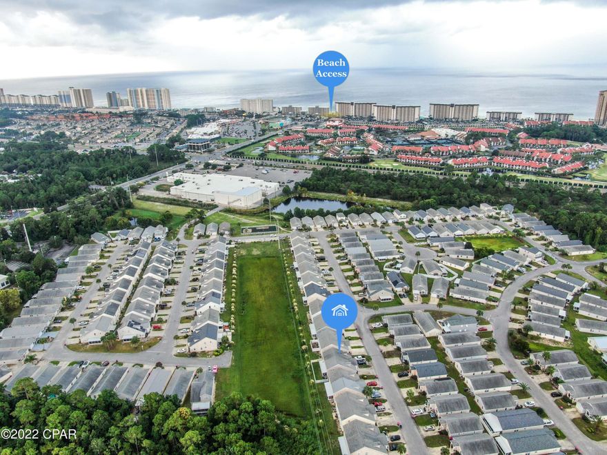 CURRENTLY UNDER CONTRACT, SELLER WILL CONSIDER BACKUP OFFERS

This home would make a great primary, 2nd or investment property. Spacious 3 bedroom, 2 1/2 bath home just 1 mile from the beach. Nicely laid out with vaulted ceilings in the family room and the main bedroom is on the 1st floor. This home has a screened in back porch and a shared fenced in yard which makes it unique. Home includes the Refrigerator and washer/ dryer that are all less than 2 years old. HOA fees include 2 community pools, playground, gated access, security, community yard maintenance & front yards & trash pickup. Palm Cove is a gated community that offers 2 large community pools, playground and more. The grocery store is less than a mile away and great restaurants are all around.  You don't want to miss this one!