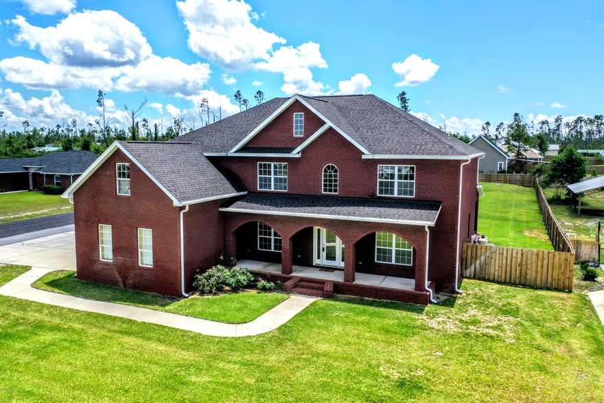 5431 Wymore, 5 bedrooms, 4 bath home and over 3700 square feet and over half an acre on a corner lot! Custom built, all brick, meticulously kept, definitely the WOW factor. With no HOA, large corner lot, massive amount of fenced in back and side yard for RV, Boat, Shop and the in-ground pool is already there! 3 garages and ample driveway space, front and back covered porches designed for entertaining and relaxing. Step in to cathedral ceilings, tile floors, open family room and kitchen with master suites upstairs and downstairs. Bonus room off the master for office, nursery, workout as well as another space upstairs for a play area / pool table that overlooks the downstairs. Fantastic floor-plan, new roof, clean, crisp and ready to move in. Come tour today!