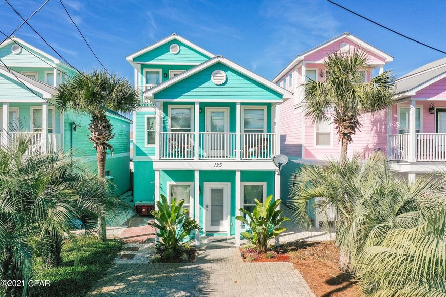 Amazing opportunity to own a Gulf view home just blocks from the beach in desirable Laguna Beach on the west end of Panama City Beach. Enjoy the low key environment yet still be close to the conveniences of Pier Park or iconic Scenic Highway 30A. This 2,069 sq. ft. Florida cottage offers 4-bedrooms, 3-baths, an additional top floor sun room, two balconies with Gulf views and a private screened-in pool, ideal for entertaining and relaxing. There is inviting curb appeal with the paver stone driveway and tropical landscaping leading up the front porch. The interior features bamboo flooring on the lower level, an open floor plan, crown molding and ideally a bedroom and bath on the first floor right by the pool. The kitchen has nice granite countertops and breakfast bar which is perfect for casual dining along with extra seating in the dining area. There are beautiful maple cabinets, a pantry and stainless steel & black appliances. The first floor also encompasses a nice bedroom and full bath right by the pool. The screened-in pool deck is a perfect addition to the home and there is plenty of room to relax with multiple loungers and a table and umbrella for outdoor dining. The second level has an incredible master bedroom that is very spacious with vaulted ceilings, a private balcony with Gulf views, an extra sitting area, large walk-in closet and ensuite bathroom with double vanity, garden tub to unwind in and separate shower. There are two additional guest bedrooms and a guest bathroom on this floor. The top floor features an incredible bonus "sun" room that has lots of windows for great natural light. There is a full bed, couch area, desk and another private balcony with panoramic views of the stunning Gulf of Mexico. There is a an outdoor shower for washing off after a day at the beach and a laundry closet with a full size washer & dryer. The home was recently redecorated and sold fully furnished! The established rental income of nearly $65,000 annually make this a great investment, especially for being this close to the beach. This is also still ideal for a full time residence or second home as it is a perfect spot to enjoying that coastal lifestyle you crave. There is no HOA or hidden fees! Don't miss out.