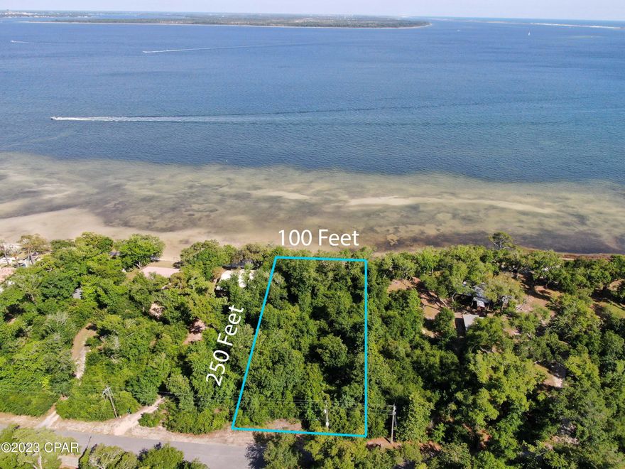 This High and Dry .573 acre bay front lot located in Panama City Beach on Delwood Dr is a prime piece of real estate offering stunning views and unparalleled access to the bay and sits in  Flood Zone X. Situated on the waterfront, this lot provides an exceptional opportunity to build your dream home in one of the most sought-after areas of Florida's Gulf Coast. 

With a size of over half an acre, there is ample space to construct a spacious residence, with plenty of room for outdoor living areas, gardens, and entertainment spaces. The lot is located in the quiet, residential road on Delwood Drive and is offering a peaceful and serene environment, with the added bonus of easy access to the beach, restaurants, shops, and entertainment venues. Bay Point and the newly renovated Bay Point Marina is located less than a mile from this property.

This bay front lot provides a unique opportunity to own a slice of paradise in one of the most desirable locations in Panama City Beach. Whether you are looking for a permanent residence or a vacation home, this property offers a perfect blend of privacy, relaxation, and luxury. Don't miss out on the chance to own this prime piece of real estate on the Gulf Coast and St Andrews Bay.