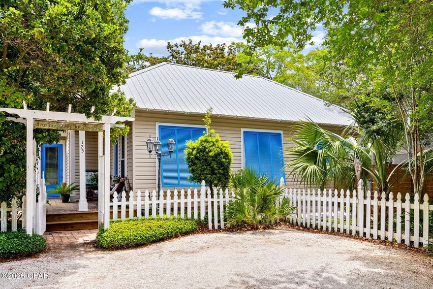Beautifully designed and built to reflect true island-style living, this meticulously maintained home offers a rare opportunity priced under market value for a quick sale at $625,000. Featuring 10-foot ceilings, 9-foot doors, and transom windows above every doorway, the home feels bright, open, and full of character. The flexible layout includes two full kitchens and a separate entrance GUEST HOUSE divided by the laundry room, making it ideal for multi-generational living or rental potential. The primary suite in the main home features a spacious walk-in closet, a large jacuzzi tub, and a separate walk-in shower with a floor-to-ceiling window that fills the space with natural light. Recent upgrades include new hurricane-impact windows, hurricane shutters, a 30-year roof, new Trex decking, and new custom Hurricane shutters. The property is fully enclosed with a brand-new fence and offers separate backyard spaces, all surrounded by lush, thoughtfully designed landscaping that creates a private, garden-like setting. This unique home blends charm, functionality, and value--and is expected to sell quickly. Call for more info.