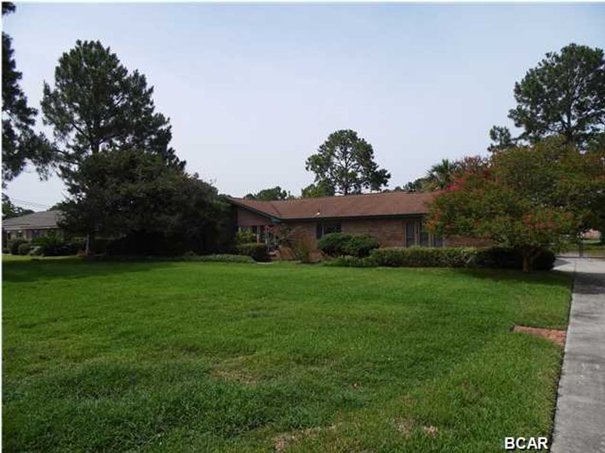 North Shore Canal waterfront with 2 docks, one having lift and is covered. One hundred twenty feet on Canal a short boat ride to Upper Goose Bayou and Bay. All brick, outside shower and covered patio with built in fire pit. Finished enclosed porch(12'x13') is not heated and cooled and is not added to square footage of living space but may be used as such. Living area is open with wood burning fireplace. Dining area is open to the living area. In flood zone AE, flood insurance required. Survey and elevation certificate available. Seller will give buyer $1,500.00 toward first year flood premium.