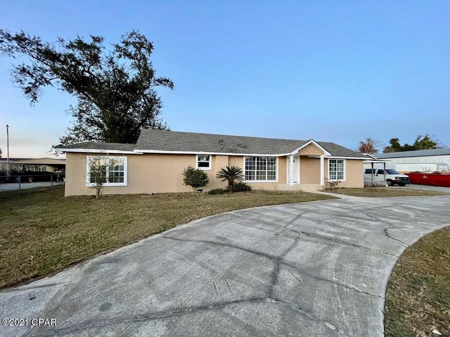 BEUATIFULLY REMODELED HOUSE. It is different from all other homes complete with Circle Drive and Concrete Parking for 10+ Vehicles. Two Large RV Garages, with separate Electric. Double car Garage/Workshop with 2 Automatic Openers on the Doors. This is a rare find! The large garage is equipped with electricity! Freshly painted deck off from the living room, large circular driveway, nice area for gardening.  This 3 Bed/2 bath features all new LVP flooring through out the house. The kitchen overlooks the dining/living area and features beautiful quartz counters and stainless appliances. Master Bedroom with walk in closet. Private Back yard. All measurements, and sizes approximate; buyer to verify if important. This home will sell fast, so do not delay! . You must see this home!!!!!