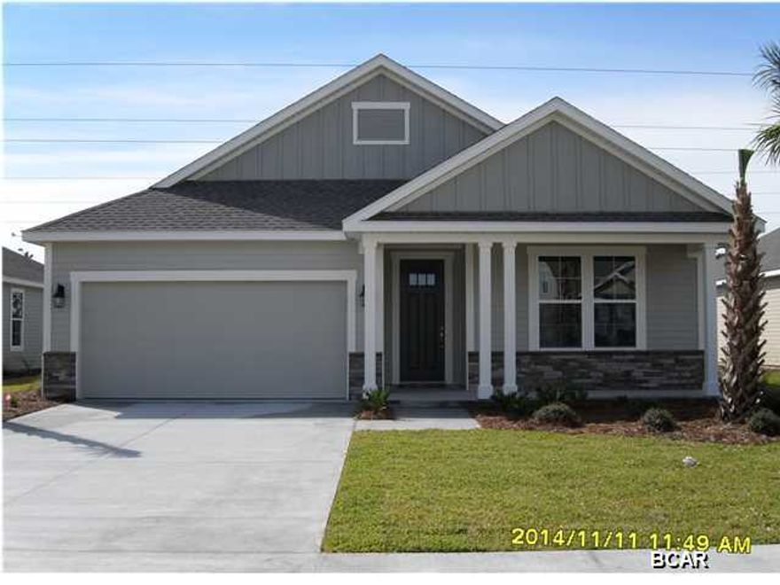 This home has a Bonita Floor Plan with a  Craftsman elevation. This house is a new construction Model Home Example and not the actual house being built. A Samuel Taylor built home includes standard features such as designer carpet in main areas and bedrooms, 8 ft. 2 panel craftsman interior door package, brushed nickel fixtures and faucets throughout, insulated (R19) interior common walls and insulated (R38) ceilings, and durable Sherwin Williams premium interior wall paint. Kitchen features stainless steel appliance package (range, dishwasher, & microwave) and over sized 36'' wood cabinetry with crown molding, and granite counter tops. Full bathrooms include raised vanity heights, large tile flooring in bathrooms and laundry rooms, 2 x 6 Exterior Wall Construction, and hurricane tie down rod anchor system. Exterior of home includes coastal and craftsman architecture, spacious 2 car garage, architectural roof shingles with an extended warranty, low maintenance aluminum fascia and vinyl soffits, termite treated foundation, Hardi-Plank siding with an extended warranty, and durable Sherwin Williams Loxon exterior paint. All new construction homes are backed by a 2-10 Home Buyers Warranty. Your HOA dues includes lawn maintenance for the home. The Whisper Dunes subdivision includes sidewalks, curb & gutter, a beautiful community pool and pool cabana. Whisper Dunes is a golf cart friendly community and you are within a short driving distance to our beautiful beaches, Pier Park shopping, NW FL Beaches International Airport, and the beautiful 30A South Walton area. Choose your lot, floor plan & elevation, choose your design options, and pick your paint colors! All measurements and sizes are approximate, please measure for accuracy and verify all sizes.