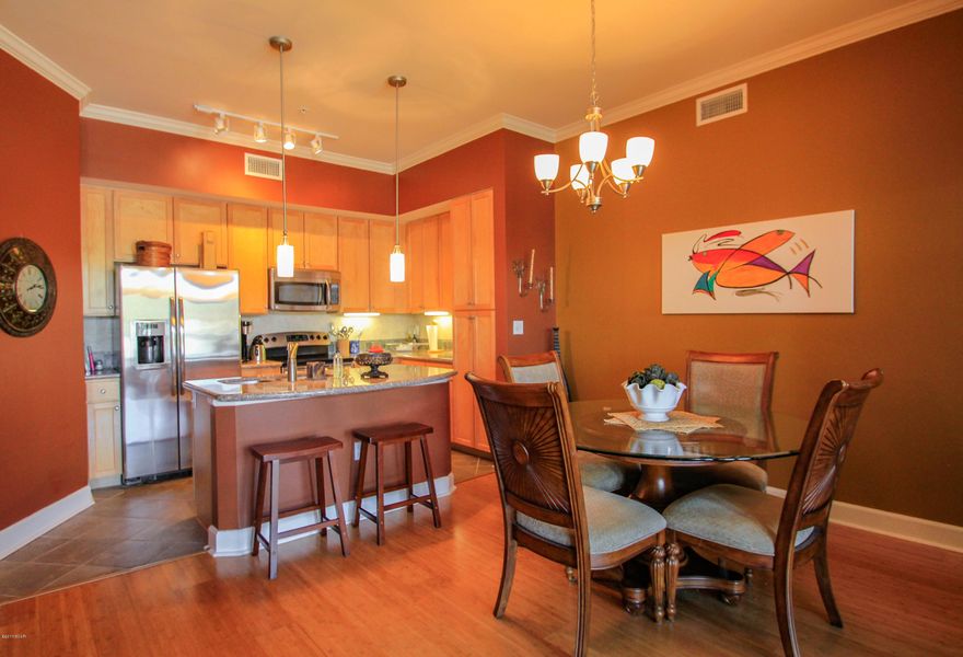 Unbelievably Priced 2 bedroom 2 .5 bath Furnished unit. Accepting Back up offers. Bring your toothbrush and family photos and you are ready to live in Bay Counties nicest Gated Community, that is for Primary Residents.No Vacation Rentals This community boasts a 1 acre pool, state of the art Fitness center, indoor basketball Court, covered parking and security.The community feels like a resort with its fountains and waterfalls and is kept up like one. The social committee has great monthly events.  The dues are the some of the lowest for condos anywhere on the Beach. 796.42 a quarter. The unit has 2 Master suites with 2 walk in closets and stainless appliances, bamboo floors. The furniture is good quality.  This one won't last long.  None of the units at Island Reserve rarely do. Check it o