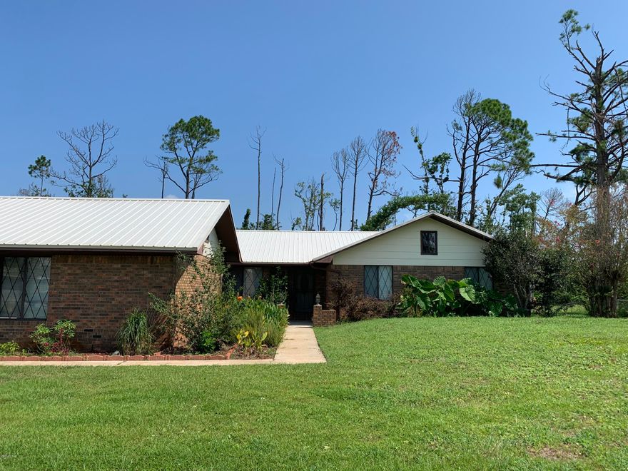 4 Bedroom 2 bath Ranch style home in Panama City. Home has been updated from roof, cabinets, appliances, lighting, flooring, fixtures. Whole house  water filtration system. Great home for a growing family. Large back yard, screen porch, outside shower and extra RV parking & hook up. Pet Friendly with approval and a non-refundable deposit.