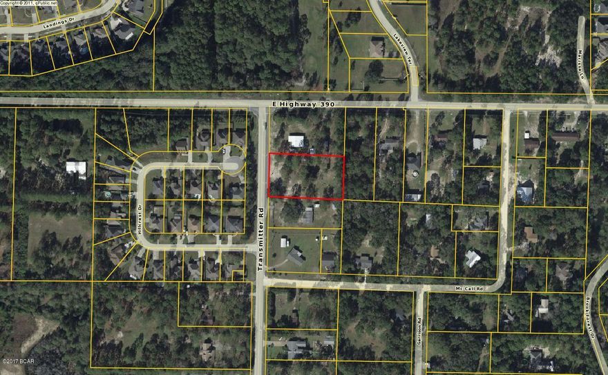 Fantastic 1 acre building lot located just off the intersection of Hwy 390 and Transmitter Rd. The property has persimmon, plum, pecan, and oak trees. There is even some grapes!  Water and sewage is available as well.  Not many lots this large left this close to town.  Perfect for building your dream home!