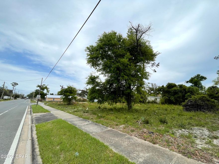 The possibilities are endless with this conveniently located large corner lot in St. Andrews. This lot is the perfect spot to build your next home or townhomes to increase your investment portfolio. Close to Gulf State College and easy access to Panama City Beach and 30A. The lot is suitable to be subdivided up to 4 townhomes. Lot is in Mixed Use Two - can be used for your small business.