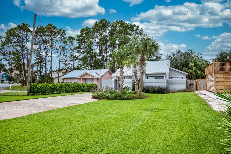 Owner has spared no expense on this completely renovated 2bd/2ba beach home perfect for a retired couple or an investor looking for a prime rental property.  Just a short walk or golf cart ride to the beach. This home offers vaulted ceilings in the living area, large spacious bedrooms, Driftwood tile throughout and a wood burning fireplace with Pecky Cypress mantle.  Kitchen upgrades include stainless steel appliances, tiled backsplash, Carrara countertops and a large pantry.  Each bedroom comes complete with a modern tile bath and private patio.  A Large screened porch and patio helps create an oasis in your private back yard.  Beautifully landscaped lawn complete with zoysia grass.