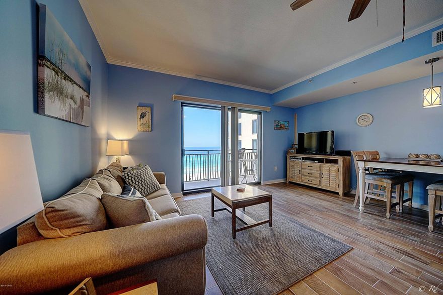 GULF FACING studio at Origin at Seahaven. Enjoy unobstructed Gulf views 24/7.  Take a step onto the balcony and immerse yourself in the warmth of our nightly Florida sunsets.  Equipped with a stainless steel mini refrigerator/freezer combo, cooktop, and microwave/range hood.  The living area has wood plank tile flooring that offers the durability of tile floors with the luxury look of hardwood.  Bathroom has a double vanity. Recently updated and still looks brand new! This unit has a direct view of the gulf facing pool that is located outdoors on the 4th floor. Origin at Seahaven  features a theater room, fitness room and roof top BBQ  pit.  There is a cafe & Starbucks inside the Saltwater Marketplace that is situated in the same complex for ultimate convenience and enjoyment. Whether you're looking for a home away from home or your next investment, this property is a must-see!