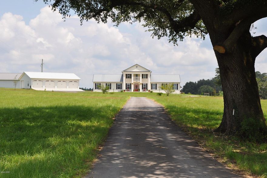 PRIVATE, SECLUDED AND CENTRALLY LOCATED IN COTTONDALE, FL. - IDEAL LOCATION FOR SPORTSMEN AND/OR NATURE LOVERS! COLONIAL HOME WITH TOP OF THE LINE FINISHES THROUGHOUT ON A GORGEOUS 67 ACRE FLORIDA FARM; FULLY FENCED/GATED AND COMPLETE WITH A 6-CAR GARAGE, 2500 SQFT BARN, PLUS A POLE BARN FOR TRACTORS - ALL IMMACULATE.  THE HOUSE IS 3900 SQUARE FEET WITH 3 SPACIOUS BEDROOMS, 2.5 BATHS, A LARGE BONUS ROOM (CURRENTLY USED AS OFFICE/WORKSPACE) AND A FLORIDA ROOM - ALL WITH A 22 KW WHOLE HOUSE GENERATOR FOR PEACE OF MIND. THERE IS A LARGE SCREENED PORCH FOR GRILLING, ENTERTAINING OR ENJOYING NATURE. THE KITCHEN HAS ALL STAINLESS APPLIANCES, GORGEOUS GRANITE COUNTERTOPS AND A 6-BURNER GAS STOVE. BEAUTIFUL HARDWOOD FLOORS THROUGHOUT MOST OF THE HOME.  BATHROOMS, FLORIDA ROOM AND LAUNDRY ROOM ARE TILE. THE PROPERTY INCLUDES 30 ACRES OF CULTIVATED FARMLAND LEASED ON A CROP TO CROP BASIS (ALTERNATING CROPS OF PEANUTS AND COTTON). THE LAKE IS STOCKED WITH BIG-MOUTH BASS, BRIM, CRAPPIE & CATFISH. TROPHY DEER, DOVE, QUAIL AND OTHER GAME MAKE THIS A HUNTER'S DREAM HOME!  A CREEK FLOWS EAST ALONG THE BACK OF THE PROPERTY.  JUST 30 MINUTES TO DOTHAN, 7 MINUTES TO I-10, 20 MINUTES TO MARIANNA AND 1 HR. TO WORLD'S MOST BEAUTIFUL BEACHES!! ALL SIZES AND DIMENSIONS APPROXIMATE. BUYER TO VERIFY IF IMPORTANT.  PRIVATE SHOWINGS BY APPOINTMENT ONLY.