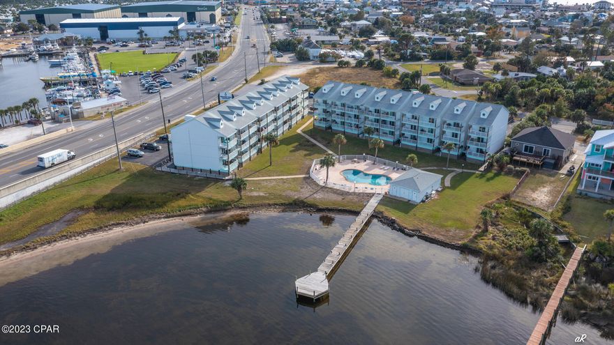 UNDER CONTRACT. SELLER ACCEPTING BACKUPS  Attention Investors or anyone looking for a primary or secondary home on Panama City Beach! This beautifully furnished, short term rental is turn-key and ready for a new owner. This unit is located in Treasure Cove Condominiums, a lower density complex that overlooks the beautiful Grand Lagoon. You'll be in very close proximity to St. Andrews State Park, Shell Island, & several public beach accesses. You will also find marinas, great local restaurants, boat/jet ski rentals, fishing charters and other tourist attractions within walking distance. The unit itself features newer furnishings and recent renovations which include ceiling fans, light fixtures, white shaker style cabinets, quartz countertop, tile backsplash, stainless steel appliances, subway tile, and vinyl plank flooring. Come enjoy all that Panama City Beach has to offer.  This is waiting to become your home!