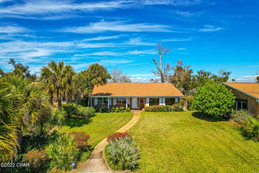 'CURRENTLY UNDER CONTRACT, SELLER ACCEPTING BACKUP OFFERS' Bay views and a private deeded beach on Scenic Historic Beach Drive will have you falling in love the moment you see this home. Large windows create captivating views right from your living room! With 4 bedrooms, 3 bathrooms and over 2,600 sqft of comfortable living space this home creates the perfect setting for relaxing and entertaining. Other highlights include a 2 car garage with a back entrance, a water heater less than 2 years old, roof installed in 2018, a storage building, lush landscaping, a large covered porch and your own private white sand beach where you can watch the breathtaking Florida Sunsets. Not only is this home located on the highly desirable Beach Dr it is a short distance to St Andrews and Historic downtown. Reward yourself with this rare opportunity to own a home in this location. Call to schedule your private showing or for additional information.