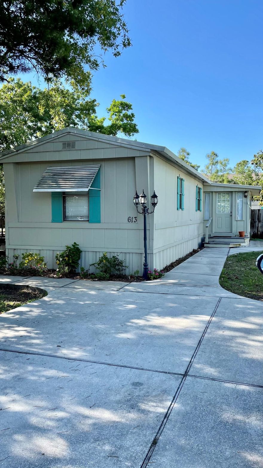Adorable and clean beach house within .5 miles to the beach.  This two bedroom two bath home has been well-kept.  The split bedrooms each have Enjoy evenings in the enclosed Florida room or on the Gazebo covered deck.  There is an out building for lots of storage.