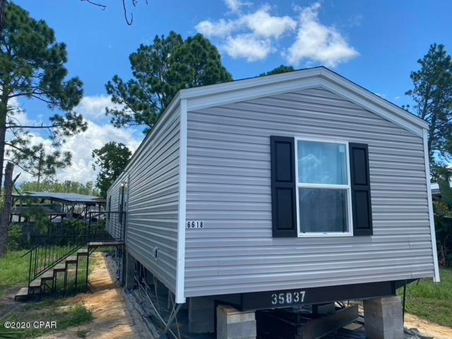 Brand New 2020 3 bedroom/2 bathroom, 902 sqft. mobile home in Panama City Beach. Centrally located close to beautiful beaches, seconds from public boat launch, 4 minutes away from Panama City Beach Parkway, and 25 minutes from Tyndall AFB.



The home comes fully furnished with everything you see in the photos.

Brand new fridge, oven, dishwasher in the kitchen along with a round wooden dining table with four cushioned chairs; plates, utensils, glassware, cookware, toaster, microwave, coffee maker, and more. 

In the family room is an 82'' sofa, sitting chair, 2 side tables, coffee table, floor lamp, table lamp, and tv console with a 40'' LCD tv.

Each bedroom has a dresser/chest, side table(s) with lamp, and complete bed set up with headboard.

Electric dryer and high efficiency top load washer in the laundry room.

The exterior photos show the unit without its skirting, but that will also be included. A brand new 8x10 wooden deck is being built for the front door so the skirting will be added back once that is complete in the next few weeks.

The lot is 50' x 97' and has an asphalt driveway that can fit three cars. The home is on city sewer and water.

While it is for sale, the unit is being occupied by a month-to-month tenant who currently has it rented through the end of August. Please schedule a time to view the home through your realtor and do not disturb the tenants.

This would make a great home or excellent rental property especially since it comes fully furnished. Currently, this unit is being rented for $90+ per night.