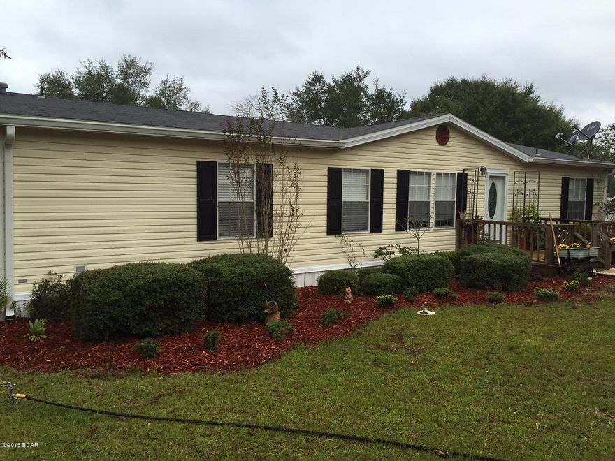 This waterfront home has been recently remodeled, upgraded and ready for a family that enjoys living on a large, gorgeous clear lake. An open floor plan, it has 3 bedrooms, 2 baths with vaulted ceilings. The master bathroom was gutted and has a huge walk-in tile shower, closet and tile floor. The other two bedrooms are on the opposite end of the home along with a full bathroom with a tub and shower combo. There's lots of cherry cabinets and counter space. French doors lead to an large deck the length of the home, great for lake views and entertaining. The front door and carpet are new, Brazilian cherry hardwoods are new in the eat-in kitchen and hallway, as is the ceramic tile in both bathrooms. The AC/heat unit is 3 years old, the roof is 7 years old according to the owner.