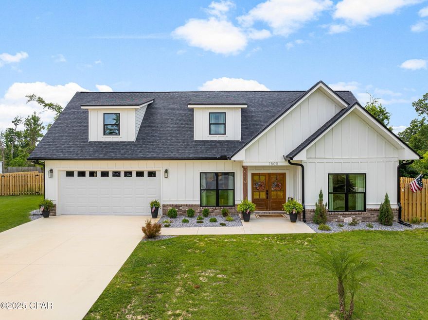 CURRENTLY UNDER CONTRACT, SELLER WILL CONSIDER BACKUP OFFERS
Tucked at the end of a quiet cul-de-sac, 1800 Echo Lane is a beautifully designed modern farmhouse offering timeless style, generous space, and thoughtful upgrades throughout. Just two years old, this meticulously maintained home sits on a 1.3-acre lot—partially fenced for privacy, with the backyard extending well beyond the fence line to offer room for gardening, play, or future additions.

From the curb, the home's bold black finishes and clean architectural lines make a striking impression. Inside, an open-concept layout welcomes you with luxury vinyl plank flooring, creamy white walls, and an abundance of natural light that fills every corner.

The kitchen is both stylish and highly functional, featuring stainless steel appliances, a porcelain farmhouse sink, soft-close cabinetry, and a convenient pot filler—all combining to create a space that's ready for everyday living and entertaining alike.

The main-level primary suite is a peaceful retreat, complete with a spacious bedroom, large walk-in closet, and a spa-like ensuite featuring a double vanity, separate water closet, and a stunning walk-in shower with dual rain heads, a handheld sprayer, and a built-in bench.

Upstairs, you'll find two generously sized bedrooms, a full bath with double vanity and tub/shower combo, and two versatile living areas—including a cozy loft and a bonus room over the garage that could easily serve as a fourth bedroom, media room, home office, man cave, or gym.

Step outside through the French doors to a screened-in covered back patio, enhanced with a wood-paneled ceiling and cooling fan, creating the perfect space for year-round relaxation. The privacy-fenced backyard is ideal for pets or play, and the full irrigation system keeps your lawn lush and low-maintenance.

Combining modern comfort with elegant finishes and room to grow both inside and out, 1800 Echo Lane offers peaceful living in a desirable location—ready for its next chapter.