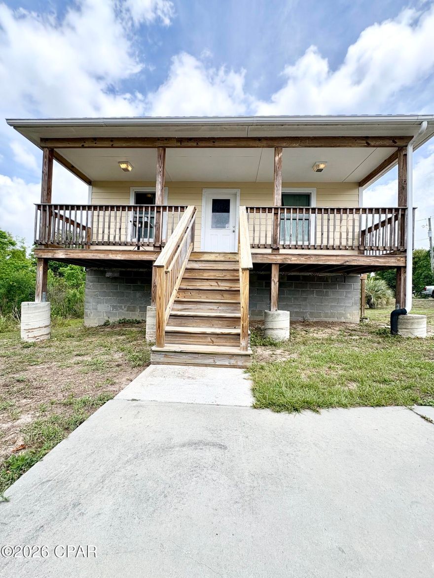 257 Arlington Drive offers a great opportunity to enjoy waterfront living on beautiful Lake Martin while still being close to everything the area has to offer. Located in an established neighborhood in Panama City, this property combines peaceful lake views with a convenient central location that makes everyday living easy. Inside, the home has a warm and comfortable feel with natural light throughout and plenty of space to make it your own. The layout works well for everyday living, hosting family and friends, or simply relaxing after a long day. Whether you are searching for a primary residence, second home, or investment opportunity, this property offers flexibility and potential. The outdoor space is what truly makes this property stand out. Step into the backyard and enjoy direct waterfront access to Lake Martin, creating the perfect setting for fishing, kayaking, relaxing by the water, or enjoying the sunset in the evenings. Imagine starting your mornings with coffee overlooking the lake and ending your day with peaceful water views right outside your door. There is plenty of room for entertaining, outdoor gatherings, or creating your own private lakeside retreat. One of the biggest advantages of this home is its location. The property is conveniently located just a short drive from Tyndall Air Force Base, making it a great option for military personnel or anyone wanting quick access to the base. You are also only minutes from downtown Panama City, where you can enjoy local restaurants, shopping, marinas, community events, and waterfront dining. The nearby community of Callaway provides even more convenience with grocery stores, schools, parks, and everyday essentials close by. For those who love the beach, Panama City Beach is within easy reach, giving you quick access to white sand beaches, entertainment, dining, and some of the area's most popular attractions. This location truly gives you the best of both worlds with a peaceful waterfront setting and convenient access to work, recreation, and entertainment. Waterfront homes with this kind of location, potential, and lifestyle do not come around often. Whether you are looking for a place to call home full time, a weekend escape on the water, or an investment property in a growing area, 257 Arlington Drive is ready for its next chapter.