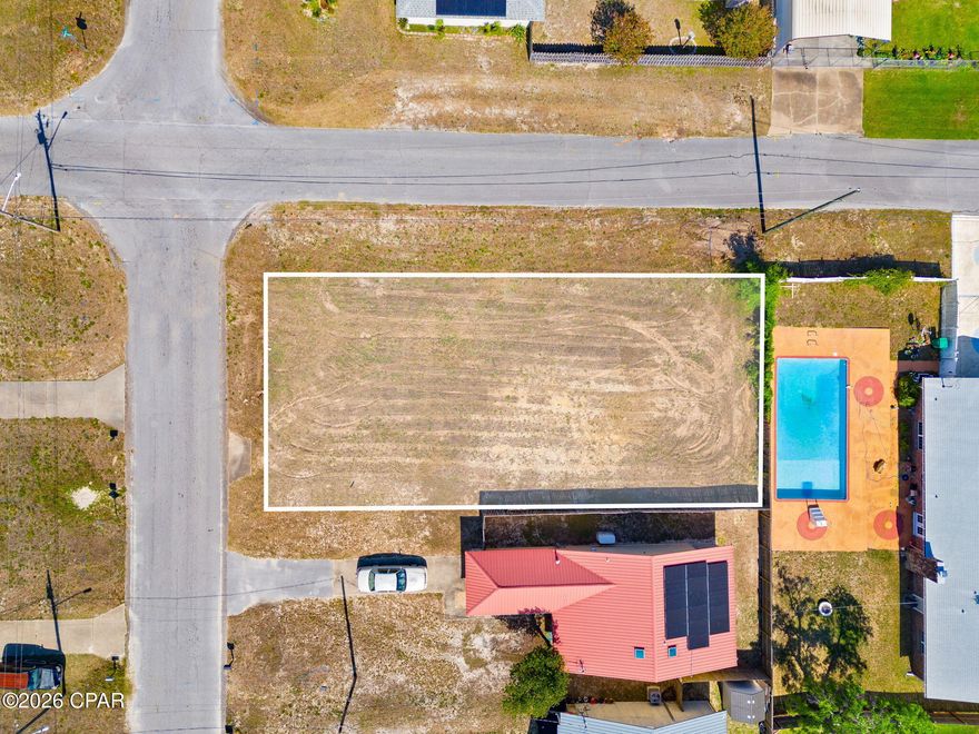 Exceptional opportunity to own a spacious corner lot in a steadily growing area of Panama City. Offering excellent visibility, added accessibility, and flexible building potential, this homesite is ideal for those looking to build a primary residence, second home, investment property, or income-producing duplex. The corner lot positioning provides additional design possibilities for driveway placement, garage access, separate entrances, outdoor living areas, and overall site layout while creating an open feel and enhanced curb appeal.
This property is well suited for duplex construction, making it an excellent opportunity for investors, builders, or buyers looking to live in one side while generating rental income from the other. With the continued demand for long-term and workforce housing in the area, the lot presents strong future income and development potential.

Located in an area experiencing continued growth and development, this property offers the perfect balance of convenience and opportunity. Enjoy close proximity to shopping, restaurants, schools, parks, marinas, and nearby waterways while still having the flexibility to create your own private retreat or investment project. With easy access to major roadways, commuting throughout Panama City and surrounding areas is simple and convenient.

Whether you envision a coastal-style duplex, modern new construction investment property, or custom-built residence with additional rental potential, this lot offers a blank canvas ready to bring your vision to life. Utilities are nearby, and the location makes it appealing for both full-time living and future resale value.

Corner lots with this kind of flexibility, visibility, and development potential do not come available often. Take advantage of the opportunity to secure land in one of the area's expanding markets and start planning your future build today.Located in an area experiencing continued growth and development, this property offers the perfect balance of convenience and potential. Enjoy close proximity to shopping, restaurants, schools, parks, marinas, and nearby waterways while still having the space and freedom to create your own private retreat. With easy access to major roadways, commuting throughout Panama City and surrounding areas is simple and convenient.

Whether you envision a coastal-style home with room for boat parking, a modern new construction investment property, or a custom residence designed exactly to your needs, this lot offers a blank canvas ready to bring your vision to life. Utilities are nearby, and the location makes it appealing for both full-time living and future resale potential.

Corner lots with this kind of flexibility and location do not come available often. Take advantage of the opportunity to secure land in one of the area's expanding markets and start planning your future build today.