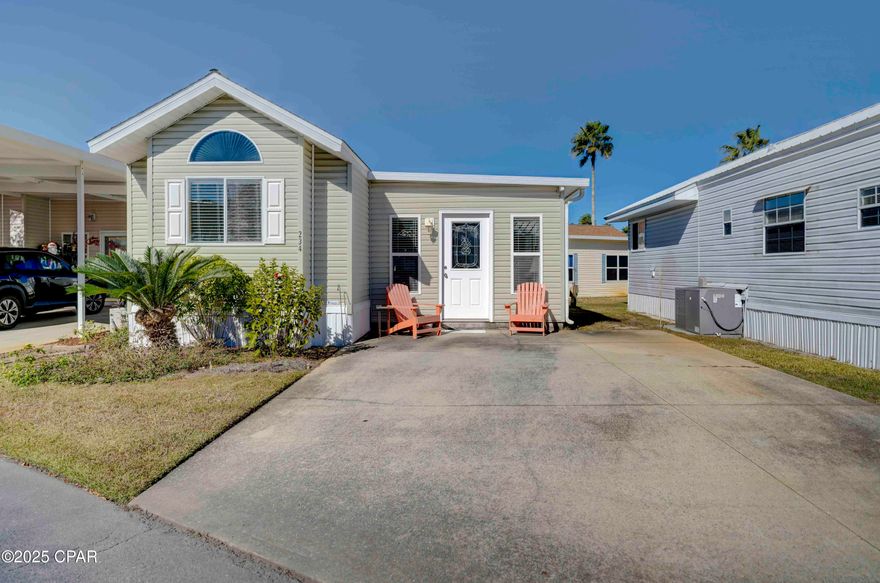 Enjoy breathtaking sunrises from this inviting beach house in Emerald Pointe Resort. The spacious lot offers plenty of potential for expansion, making it an attractive choice. Inside, you'll find a well-designed layout with two bedrooms, two bathrooms, and a bonus room that currently serves as a third bedroom/office. The kitchen and large dining area are open and welcoming, while the covered back patio is perfect for relaxing after a day at the beach. The home comes fully furnished and is ideal for use as a permanent residence, vacation getaway, or investment property.
Emerald Pointe Resort is a gated community nestled in the heart of Panama City Beach, just minutes from restaurants, shopping, and the world's most beautiful beaches. Engage in the community's fantastic amenities, which include a large clubhouse, exercise room, shared library, two swimming pools (one heated seasonally), a hot tub, a serene lake with a boardwalk, and a shuffleboard court. Your HOA fee covers water, sewer, garbage, and lawn service, ensuring you enjoy a hassle-free living experience. (WOW is running fiber optic cable in the community, and when complete, Wi-Fi will be included with your quarterly HOA Fee) This charming property won't last long—schedule your showing today! All information is approximate and should be verified by buyer if important.