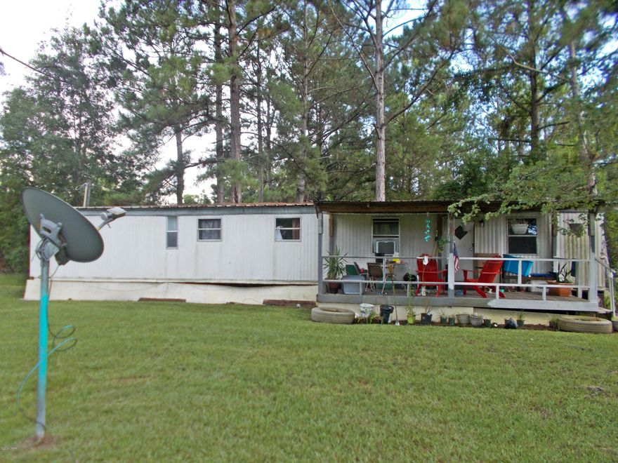 Two homes for the price of one on 6+ acres on a paved road, one of the homes is presently rented, call agent to view this home.