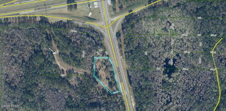 Commercial land located south of I-10 at exit 104, Caryville, immediately on the right. Over 406 feet of Hwy frontage. Excellent location for a gas station, convenience store, or whatever business you would like.