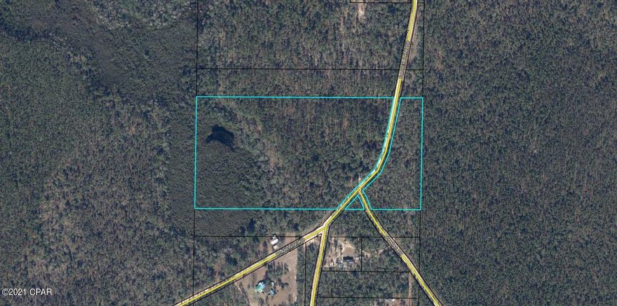 Unrestricted 25 acres not far from Porter Pond and Sunny Hills.  Surrounded by 100's of acres of Water Management land. Great spot for a small hobby farm or just a secluded getaway. Sale consists of two parcels.