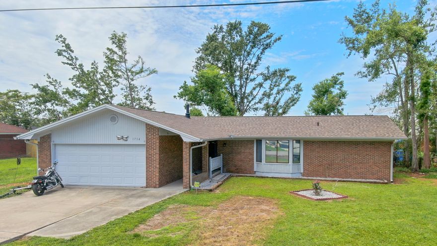 NEW ROOF, NEW PAINT inside, gutters being installed this week, new fence.  This 3 bedroom, 2 bath has a recently remodeled kitchen, and is surrounded by the open concept living/dining areas.  The master bedroom is extra large.  The fence is being repaired and the downed trees are being removed.  The two car garage offers ample room for your vehicles and/or storage.  The current owners are also doing a little work to the interior.