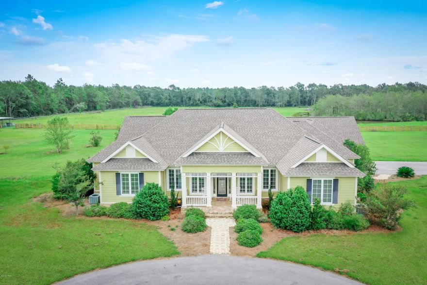 This beautiful custom built home has been well maintained and has so many great details.  The living area features a raised, coffered ceiling with built ins, open to the chef's kitchen that features a gas Thermador oven. The master suite features an oversized walk in closet with plenty of storage, a well appointed master bath, and a master bedroom that features a sitting area that opens to the large screen porch.   This home features a split floor plan with two additional bedrooms on the other side of the home.  Bonus room over garage has bedroom and full bat. Horse barn with full bath and tack room set up with 6 stalls. Several other outbuildings with 3 ponds and 2 pastures.  A Must see!!!!