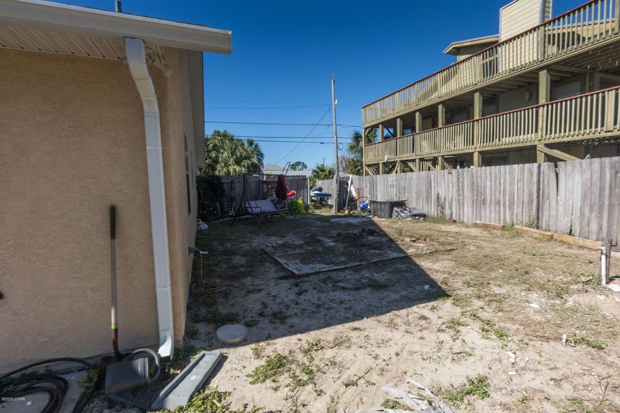 UNDER CONTRACT SELLER TAKING BACKUP OFFERS ...3 bed 2 bath located in the popular Treasure Island area. Close to many Thomas Drive Restaurants and Attractions  .5 Minutes to the Navy Base ,5 Minutes to the Beach .  Great Neighborhood for riding a Golf Cart .

Newer Roof and Huge Side Yards in with this size lot.

Put just a little love and care and make it your special Home to enjoy. The Family-Dining-Kitchen area is all open and even the back Patio area has been closed in and Heated and cooled and is used as a Kids Play Room. Single Car Garage and Large Driveway