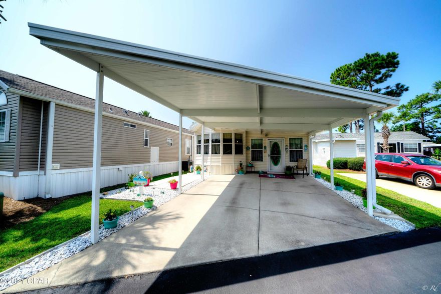 Are you looking for a charming home located in Emerald Pointe Resort, one of the highly sought-after communities in Panama City Beach? Look no further! This property has been beautifully updated, landscaped, and maintained. The home features 2 full-size bedrooms, 2 bathrooms, large addition with living room, 2 lofts for added sleeping quarters, updated kitchen with new cabinets, quartz counter tops, deep double-sided sink, tile back splash, stainless steel appliances, updated flooring, and a storage / laundry room. Additional updates also include: Roof and carport 08/2018, 50 gallon hot water heater, and a water purification system. The home is move in ready and is being sold mostly furnished. Emerald Pointe Resort is a gated community located in the heart of Panama City Beach close to... restaurants, shopping, and the world's most beautiful beaches. Amenities include a large clubhouse, exercise room, 2 pools (one heated seasonally), hot tub, lake with boardwalk, and shuffleboard court. HOA fee includes water, sewer, garbage, cable, and lawn service. All information is approximate and should be verified by buyer if important.