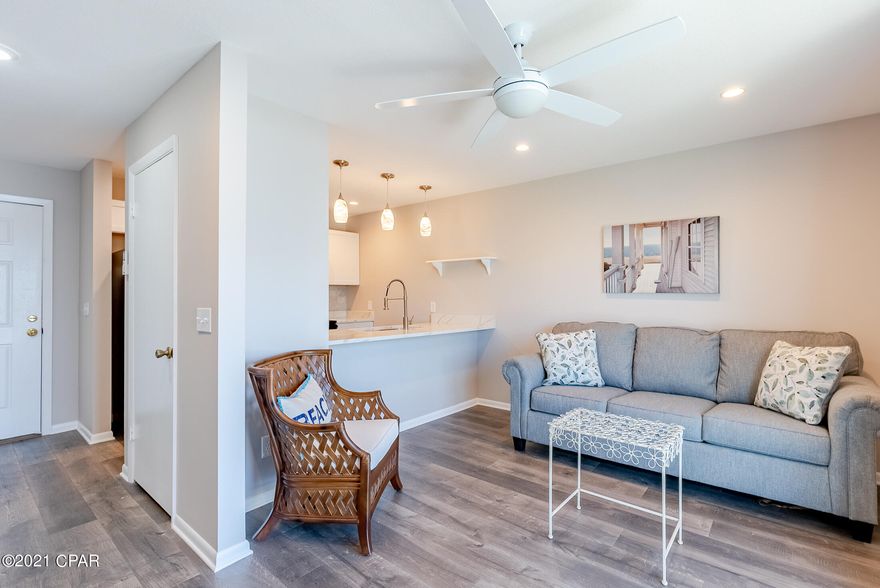 We Love this condo!! Rarely on the market, this darling ,rental ready, one bedroom unit is only a half block from the Beach Access! This condo has been updated beautifully with Beachy decor and a fabulous updated bathroom & kitchen.. Gulf view from the balcony!This quaint, Surwinds' condo is one of only 6 units in the building. The location is brilliant! Close to all the locals' hangouts! Great restaurants, beachy bars, entertainment and water activities. Easy access to all the Beach fun!! Covered parking that is perfect for golf cart and beach toys,low Hoa fees(only 625 a quarter) this would make a great rental or 2nd home. Grab your agent and come see!