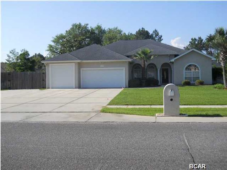 Very popular Mowat Highlands 4 bedroom home with a great jack and jill bath for 2. The 4th bedroom could also be an office. The main living area of the home offers high ceilings, open floor plan plus living, kitchen and dining. The back yard is fully fenced, very large, and is great for kids. This 3 car garage has one bay that is over sized for a motor home with a side entry for a golf cart. There is also a large concrete pad behind the privacy fence for boat parking. Some other amenities: 2 water heaters, 2 dryer hook ups,plus a water softener. The house has been very well taken care of.
