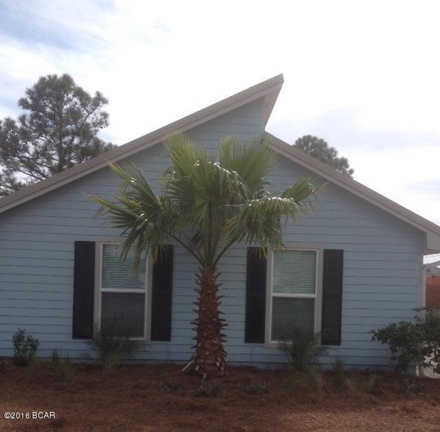 INCREDIBLE PRICE **FANTASTIC CONDITION - BETTER THAN NEW - THIS ONE HAS TO BE SEEN * open floor plan with 2 bedrooms and 1-1/2 baths * vaulted ceilings * new kitchen with stainless appliances, counter tops,   cabinets & breakfast bar * ceramic tile floors * updated interior paint, lighting, ceiling fans, vanities, sinks & toilets in contemporary style  * fenced yard , outdoor shower * large lot only 2 blocks from the most beautiful beaches * recently replaced HVA/C, & water heater * new aluminum standing seam roof, exterior paint, hardi plank siding, stucco & Pella windows/ doors  MUST BE SEEN ITS ADORABLE ***