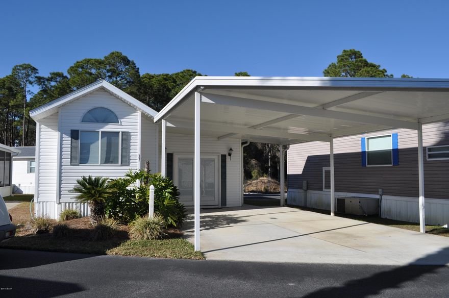 This Emerald Pointe Resort home is perfect for a weekend getaway or retired couple looking to downsize.  With 2 bedrooms, 2 baths and a bunk room, it's exceptionally spacious and fully furnished. Unlike the high-rise condos, you can park right outside your own front door! Emerald Pointe Resort is one of the friendliest gated communities near the beach with tons of amenities. There's a clubhouse, two swimming pools and a hot tub, and shuffleboard courts near the lake and boardwalk. You're less than a 5 minutes drive to the beach and St. Andrews State Park, as well as several golf courses. Low maintenance, yet finely appointed, don't let this home get away! All info is approx. and must be verified by Buyers if important