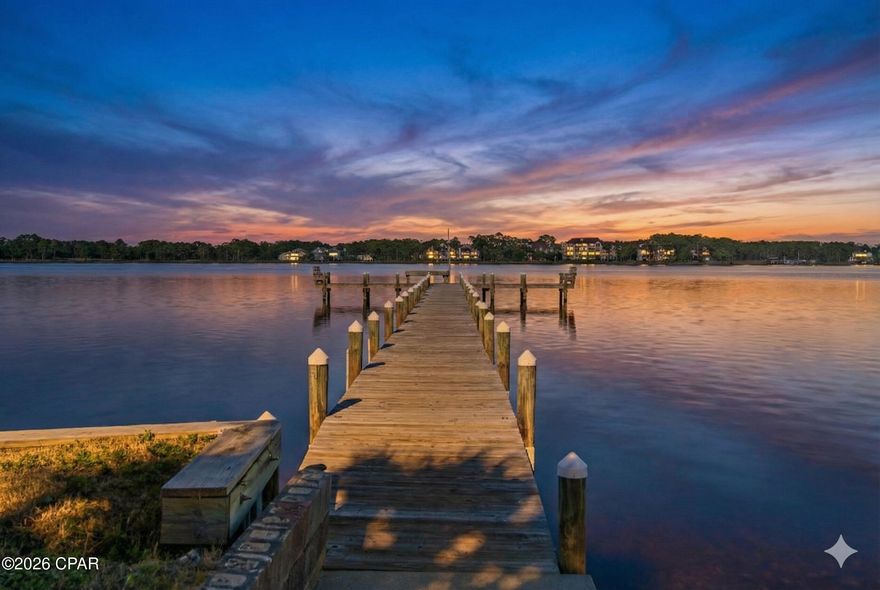 Experience refined coastal living in this beautifully updated residence in the sought-after Pirates Cove community of West Panama City Beach, offering picturesque views of Lake Powell--Florida's largest coastal dune lake.
This community boasts exclusive access to the Gulf via a private dock and boat launch - ideal setting for boating, fishing, paddle boarding, and kayaking.Enjoy the conveniences of direct water access, one of two community pools just outside your door, less than a mile to the closest beach access, as well as dining and boutiques along Scenic Highway 30A, and the natural beauty of Camp Helen State Park. Thoughtfully and completely remodeled, this home boasts a relaxed open concept enhanced by abundant natural light, and ample space for gatherings and everyday living. Inside, a bright open-concept layout with a relaxed coastal feel and thoughtful updates creates an inviting space for everyday living and entertaining. Spacious porches on both the main and second levels offer lake views and stunning sunsets. The updated kitchen is well-appointed with granite countertops, stainless steel appliances, gray shaker cabinetry, and generous bar seating, seamlessly connecting to the main living space.
Offered turn-key furnished and supported by a strong rental history, this property presents an exceptional opportunity as a primary residence, second home, or income-producing investment.