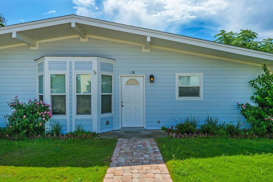 CURRENTLY UNDER CONTRACT, SELLER ACCEPTING BACKUP OFFERS - Spacious, Laguna Beach lakefront house, less than one minute to the beach! This 3 bedroom, 3½ bath home has a full bath in both full bedrooms and in the kid's bunkroom. An additional bonus room is perfect for media and games, or an extra sleeping space. Luxury finishes include stainless steel appliances, custom tile backsplash and granite countertops in the kitchen, white and glass tile in the baths, exposed beams over head, and wood-look tile on the floors. Open floor plan allows plenty of natural light from every window. Enjoy lake views from the living room or step out to the private deck for views and sun. The fenced yard has additional storage in the outdoor shed. Enjoy this convenient location close to Carousel Market, and a short drive to Pier Park to the East and 30A to the West.