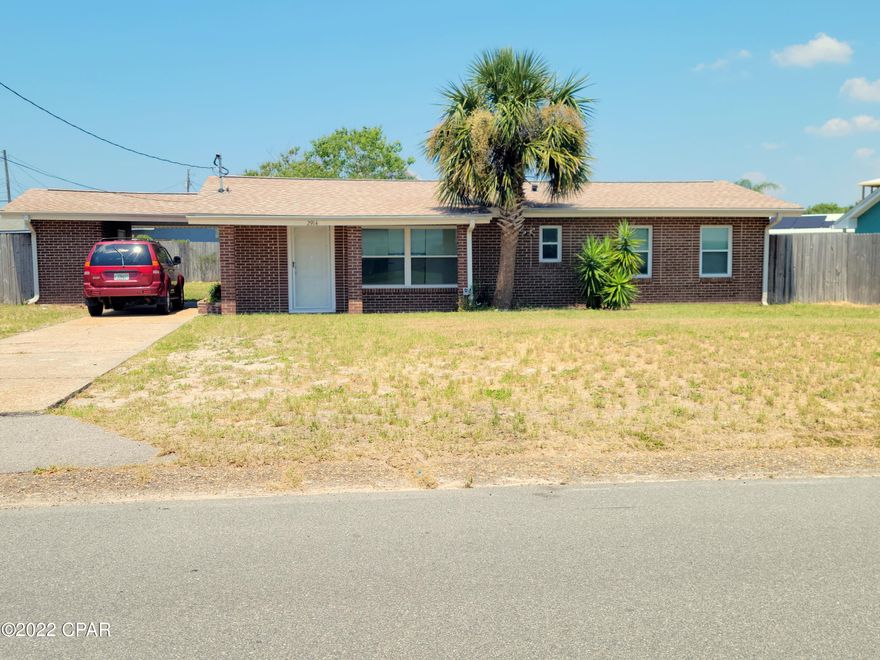 Excellent location for a Vacation Home or Rental Investment. Short term rentals across the street. Less than a 10 minute walk to the Gulf. Golf Carts  are being used in the area. The home is solid and comes with a large back yard for your lounging lifestyle. Tile flooring thru out. Put this one on your list!!