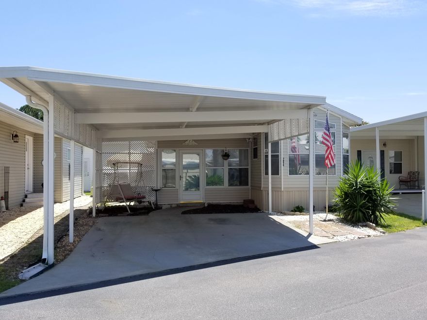 This is an adorable Emerald Pointe Resort home with the Master in the main house with a 2nd Bedroom and Large Bonus Room addition. Lots of cabinets and storage. Built in Desk & Study in the main Living Area. Adorable outdoor living and dining is available on the east side of the home and at the covered main entry. Carport has a premium custom covering. Washer and Dryer are included. This resort has dock, 2 pools, a hot tub, shuffleboard and a clubhouse with exercise room. Emerald Pointe is across from the navy base and located close to great restaurants, shopping and entertainment. You are also super close to the white sandy beaches! ALL IMPORTANT MEASUREMENTS AND INFORMATION MUST BE VERIFIED