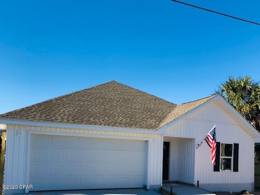 CURRENTLY UNDER CONTRACT, SELLER ACCEPTING BACKUP OFFERS This great one story floorplan offers vinyl-plank flooring, great room with cathedral ceiling, master bedroom and kitchen with trey ceilings, master extra large finished closet (no wire shelves!),fabulous granite countertops throughout, large 8.8x5.10 laundry room with cabinets and granite counter top for folding area, tiled master shower with stone floor, 14.5X22 ft covered back porch, 2 car garage, large fenced back yard, full yard  irrigation system, and 3/10 mile to the beach!