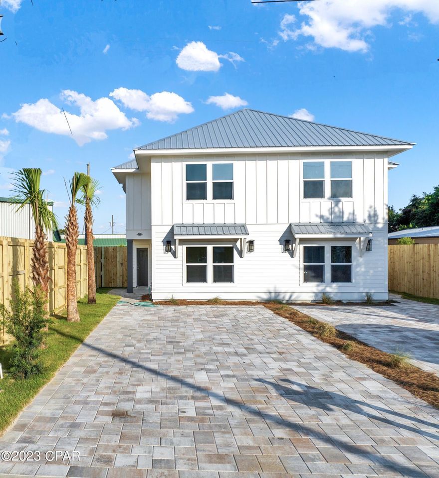 Desirable West End Laguna Beach Duplex with Inground Gunite Pools and great Short Term Vacation Rental projections. The possibilities are endless. Live in one side rent the other, Rent both sides with a short term rental projection of $263k-$301K. Can you say CASH FLOW! Each side has its own unique custom upgrades. Both Kitchens come fully equipped with all appliances. Luxury Vinyl plank flooring through out. Quartz counters and upgraded custom cabinetry. Unique fixtures and mirrors throughout.  lots of Wainscoting and Ship Lapp upgrades. 2 Master suites, 1 upstairs and 1 down stairs. The unique floor plan gives plenty of privacy and space between all the upstair bedrooms. Nice big owners storage closet out by the pool. Enjoy BBQ's under the cover lanai by the pool. Outdoor shower to rinse the sand of your feet before you step in the front door. The property is located approx 1800 ft to the beach or a short 3 block golf Cart Ride to the Dedicated Beach access. 2x6 exterior construction and Hurricane screens give you added peace of mind for coastal living. Check out this fine home from Elite Coastal Construction today. They are offering a 2/10 Builder Warranty at no charge to the buyer. *All measurements are approx measure if important.