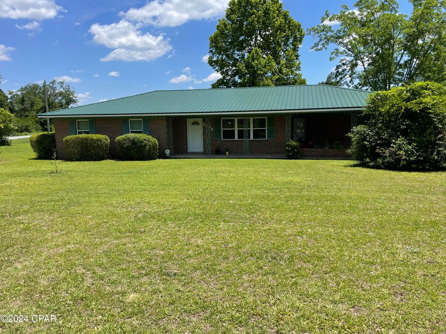 Beautiful corner lot in an established neighborhood is this 3/2 brick home in Marianna.  This home has an open concept and includes a large family room that is surrounded by windows to enjoy looking out on your large back yard.  This home has new doubled panes windows throughout except for family room.  A new roof in 2019 and a HVAC in 2018.   A new 12x24 shed was added in April 2024.  A large yard to garden or put in a pool,  two pecan trees, a pear tree and a small scuppernong vine.  Call today for your personal showing!