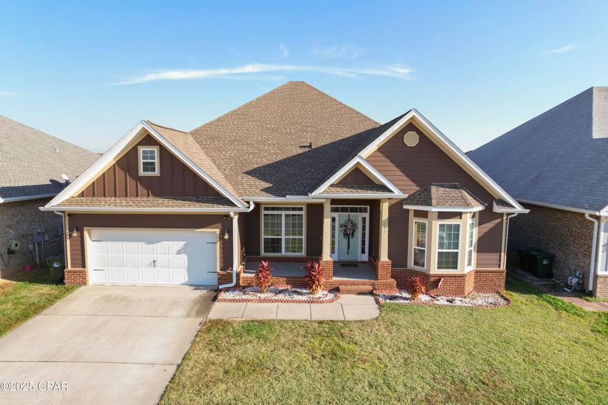 BEAUTIFUL HOME WITH BAYOU VIEWS in The Villages of Mill Bayou directly behind North Bay Haven School!  This spacious and inviting residence offers 5 bedrooms plus an office, 3 full baths, and over 3,000 sq. ft. of well-designed living space. The interior features an open, split-bedroom floor plan with high ceilings, abundant natural light, and both formal and casual dining areas.   The kitchen is a standout, showcasing granite countertops, a large island with breakfast bar, stainless steel appliances, and an extra-large walk-in pantry. The master suite easily accommodates king-size furniture and includes a luxurious bath with soaking tub, separate tiled shower, double vanity, and a walk-in closet. All additional bedrooms are comfortably sized, and the garage is oversized!  Exterior highlights include a front porch (perfect for holiday decor), a covered back porch, and a privacy fenced backyard. Enjoy peaceful sunsets from the front porch overlooking the bayou.  This sidewalk community features a community pool, a covered outdoor area with firepit, centralized mailboxes and underground utilities.  Call today for a private tour.