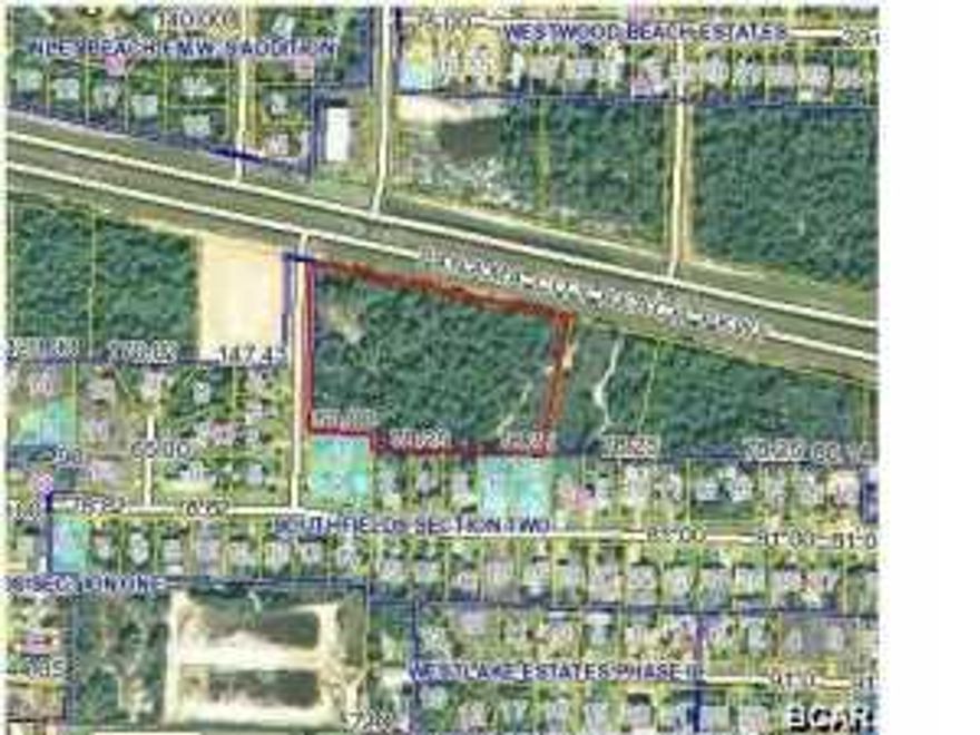 4.5 Acres of Commercial Land Fronting Panama City Beach Parkway and Florida Lane! Holds many opportunities! Zoned General Commercial. Very High Visibility! Easy Entry/Exit! High and Dry!! Make Offer!!