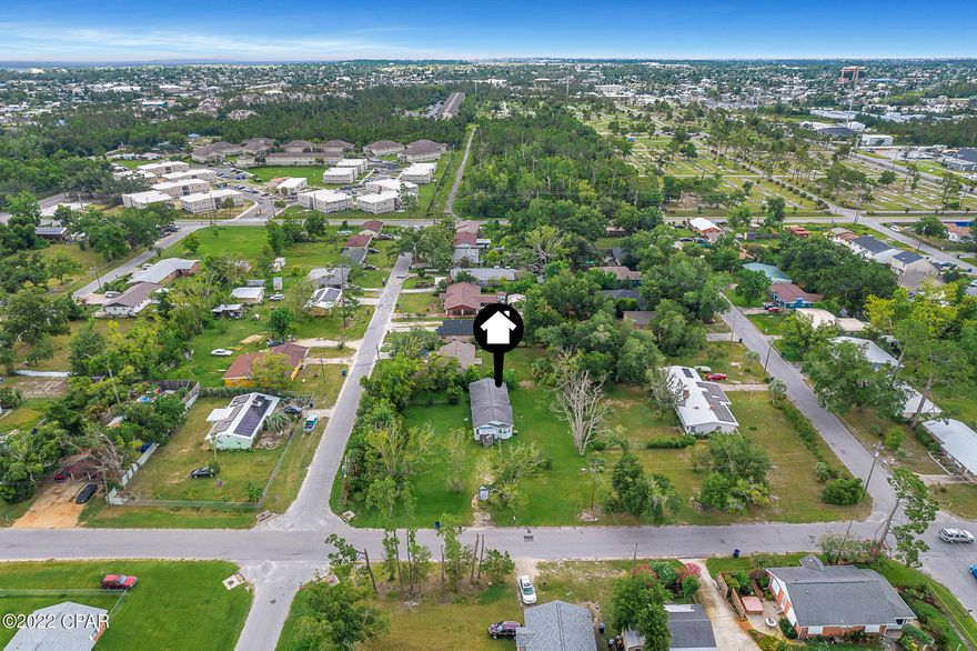 CASH ONLY, As-Is - This is a flip opportunity or starter home for someone willing to put some TLC and sweat equity on it. Home consists of a 3-bedroom, 1-bathroom and is located in St. Andrews, just 2-blocks north of HWY-98. Almost HALF acre at the corner lot at 16th and Friendship Ave. PLEASE NOTE: The windows are Vinyl and double pane, Roof, air handler and WH are older than 30-years, condensing unit is 22-years, electrical panel is at capacity, there's one broken window and the exterior is asbestos siding. Flood Zone X - so no flood insurance required. Seller to make no repairs, disposal of debris, or clean up. All Information is deemed to be reliable, but is not guaranteed, buyer to verify if important.