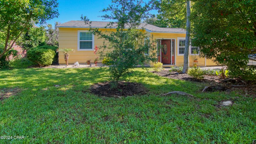 CURRENTLY UNDER CONTRACT, SELLER WILL CONSIDER BACKUP OFFERS****HISTORIC COVE CHARMER W/ MODERN UPGRADES!!!**** Welcome to your dream home, a beautifully renovated historic residence brimming with charm and modern conveniences. This captivating property offers a perfect blend of timeless elegance and contemporary comfort, making it an ideal sanctuary for those who appreciate both history and luxury. As you step inside, you'll be greeted by an abundance of natural light via all new windows, creating a warm and inviting atmosphere. The large entryway serves as a versatile bonus room, perfect for a home office, reading nook, or additional living space. As you step into the main part of the home, you will immediately appreciate the original hardwood floors and functional layout. The heart of this home is the newly renovated kitchen, featuring new cabinets, sleek countertops, and state-of-the-art appliances. The addition of new molding and fixtures throughout adds a touch of sophistication, while fresh paint inside and out ensures a pristine, move-in ready experience. Comfort is guaranteed year-round with the brand new mini-split air conditioning system. Step outside onto the new deck, perfect for relaxing or entertaining, and discover a tropical oasis in your own backyard. The spacious yard is lush and vibrant, offering a serene retreat from the hustle and bustle of daily life. For those who love to tinker or need extra storage space, the garage doubles as a workshop, providing ample room for projects and hobbies. The covered patio/bar area, connected to a spacious open patio, is an entertainer's delight, offering the perfect spot for gatherings and outdoor enjoyment. Additionally, convenient alley access enhances the functionality and appeal of the property. Don't miss your chance to own this meticulously renovated historic home, where charm and modern convenience converge. SCHEDULE A PRIVATE SHOWING TODAY!