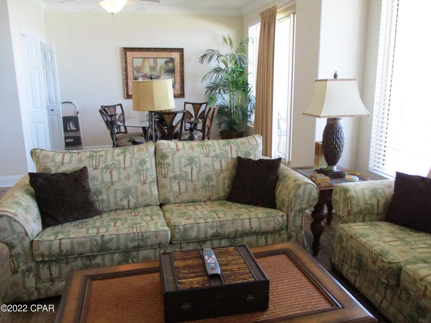 Come enjoy ownership at one of the best condo complexes in PCB.   Gulf Crest condos are very upscale with a unique spacious gulf front floor plans.  This desirable low floor unit features beautiful flooring,stainless steel appliances, upgraded ,master bathroom with a walk-in shower and granite countertops.  The relaxing open floor plan boasts over 1300 square feet of living space AND 39 feet of gulf front balcony.  You can see for miles down the beach.  The views are breathtaking.  The living, dining and master bedrooms are all gulf front with floor to ceiling windows.  Unit 405 is a popular vacation destination for repeat renters.  And boasts a great rental history.  Unit is turn key ready for moving in or renting.