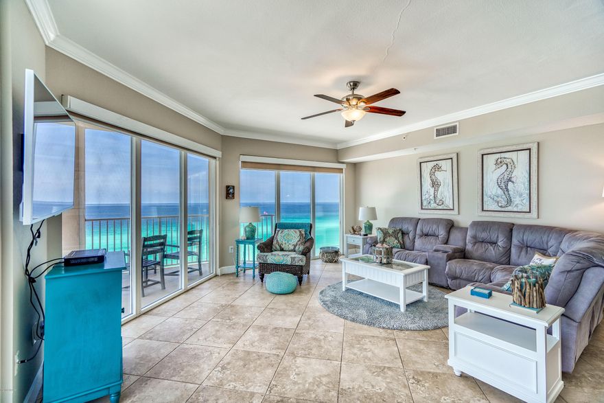Are you looking for an immaculate, turn-key, beach front condo? Great news, you found it! Welcome to Tidewater Beach Resort #817 in Panama City Beach, Florida. This gorgeous three bedroom, three bathroom, plus bunks is ideally situated on the eastern corner of the development and is a true delight! The wide open kitchen/living concept offers unparalleled views through expansive wraparound windows overlooking the fabulous emerald waters of Northwest Florida. Tidewater 817 is not on a rental program and is in PRISTINE condition. Although it's not currently on a rental program, this floor plan is known to be one of the best rental floor plans on the beach! It is a true value amongst other comparable condos in the marketplace. This condo features NO CARPET with beautiful tile on the diagonal throughout the living area and up the breakfast bar. The kitchen has been upgraded with stainless appliances and backsplash. The condo also features a front load washer and dryer,  a new HVAC, a new water heater, upgraded lighting throughout and it comes with an exterior STORAGE CLOSET! The views from Tidewater 817 will never disappoint and you can enjoy views of the pier at Pier Park to catch fireworks like you've never seen before.  Tidewater features amenities such as a Gulf front fitness center, 4 hot tubs, 2 outdoor pools, 1 indoor heated pool, game room, saunas, steam rooms, a restaurant, poolside Tiki bar, a convenience store, movie theater, covered parking garage, a conference room & an owners lounge. Tidewater is only 1/4 of a mile to Pier Park and the closest high rise building in PCB from the airport.